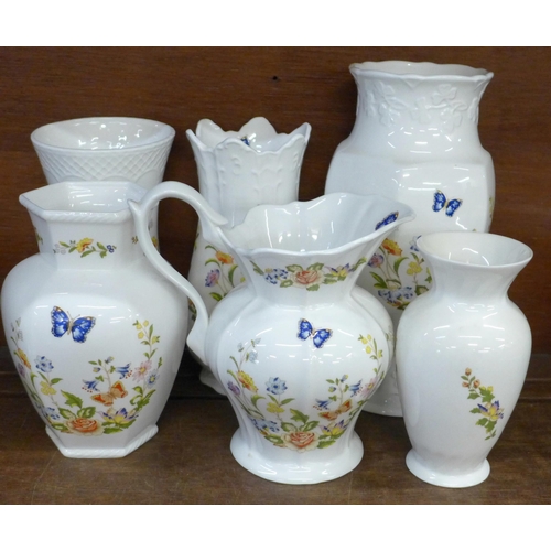 681 - A collection of fourteen Aynsley Cottage Garden vases and jugs