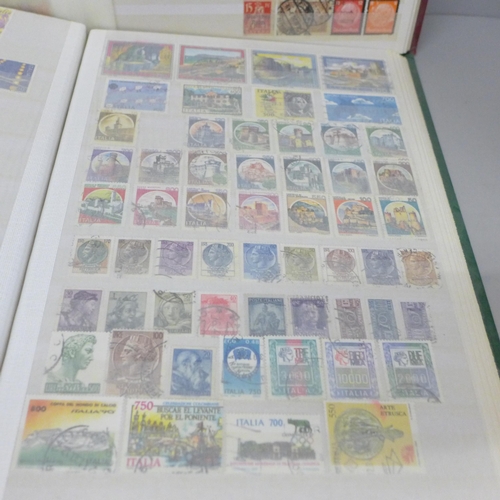 686 - A box file of World stamps in two albums