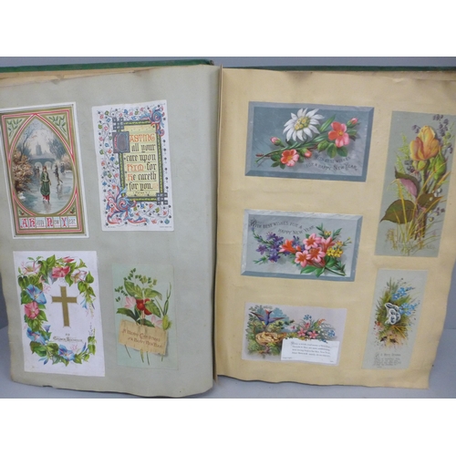 689 - An album of Victorian greeting cards, 240 in total, Christmas, New Year and Birthday, interspersed w... 