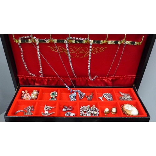 690 - Costume jewellery including silver rings and earrings and a box of earrings, some pairs 9ct gold