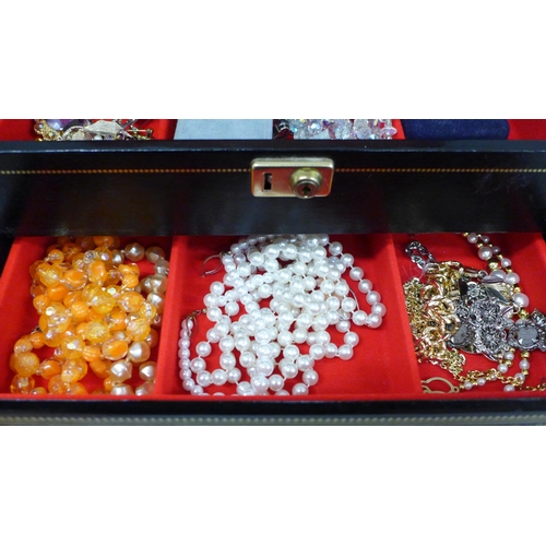 690 - Costume jewellery including silver rings and earrings and a box of earrings, some pairs 9ct gold