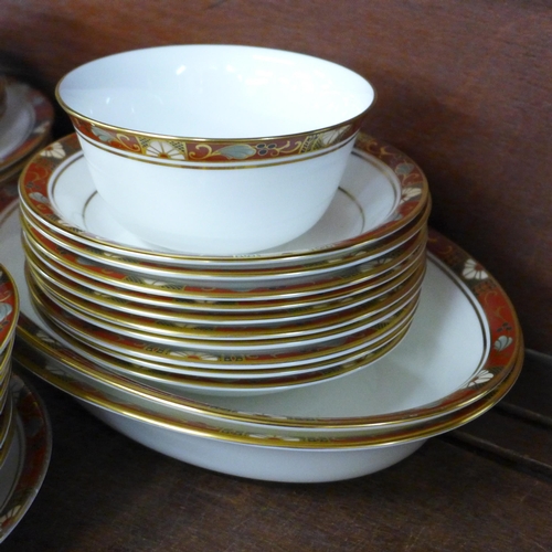 696 - A Royal Crown Derby Cloisonne tea and dinner service, eight setting, second quality