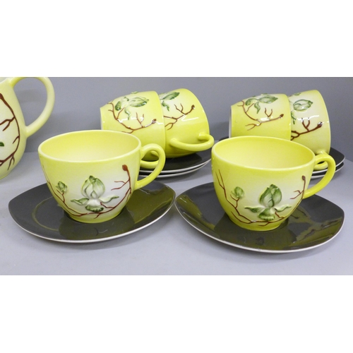 700 - A Carlton Ware Magnolia pattern six setting tea set