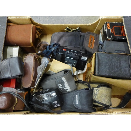 708 - Vintage cameras including Praktica, Zenit, etc.