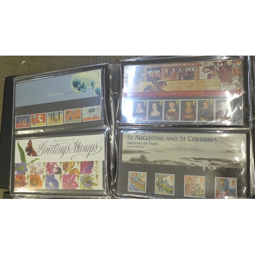 719 - GB 1990-2005 commemorative presentation packs in two first day cover albums and loose, 175 packs wit... 