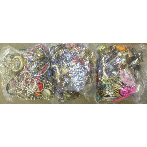 721 - Three large bags of costume jewellery