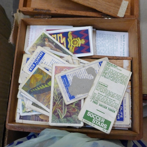 727 - A collection of matchboxes, beer mats and tea cards, also a collection of petrol station cards, some... 