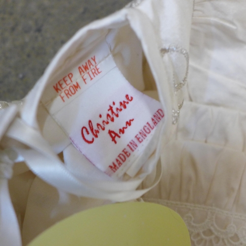 729 - Six silk christening gowns, some with tags by Christine Ann