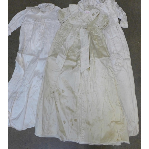 729 - Six silk christening gowns, some with tags by Christine Ann