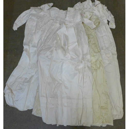 729 - Six silk christening gowns, some with tags by Christine Ann