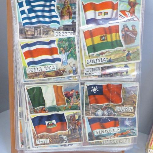 739 - A collection of A&BC Flags of The World Collectors cards and a Victory Road Vehicle puzzle