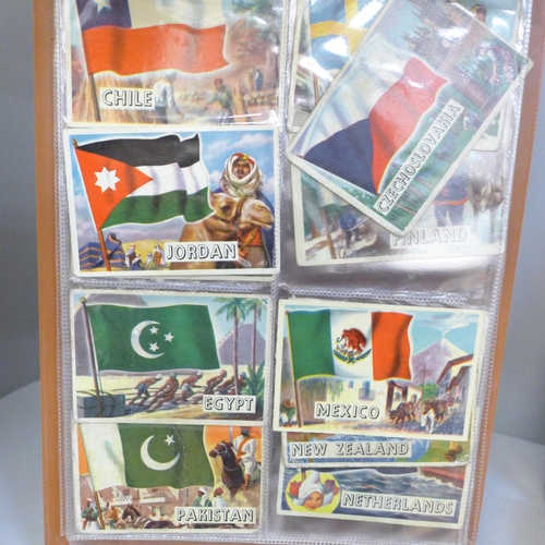 739 - A collection of A&BC Flags of The World Collectors cards and a Victory Road Vehicle puzzle