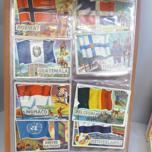 739 - A collection of A&BC Flags of The World Collectors cards and a Victory Road Vehicle puzzle