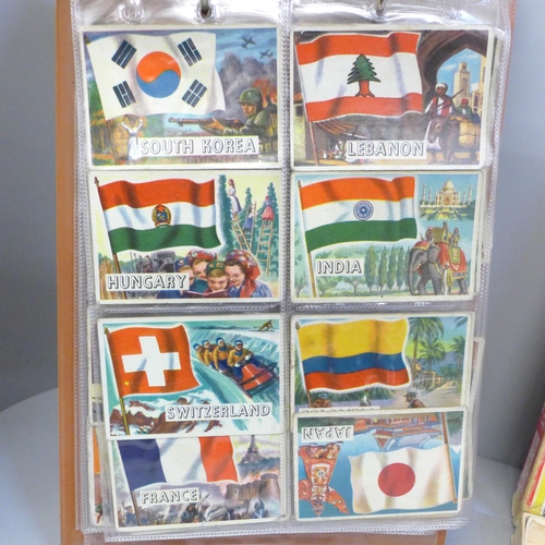 739 - A collection of A&BC Flags of The World Collectors cards and a Victory Road Vehicle puzzle