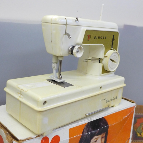 755 - A Little Golden Panoramic sewing machine by Singer and a block building set