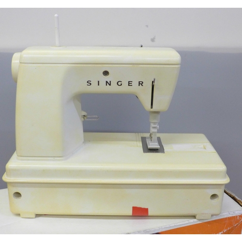 755 - A Little Golden Panoramic sewing machine by Singer and a block building set