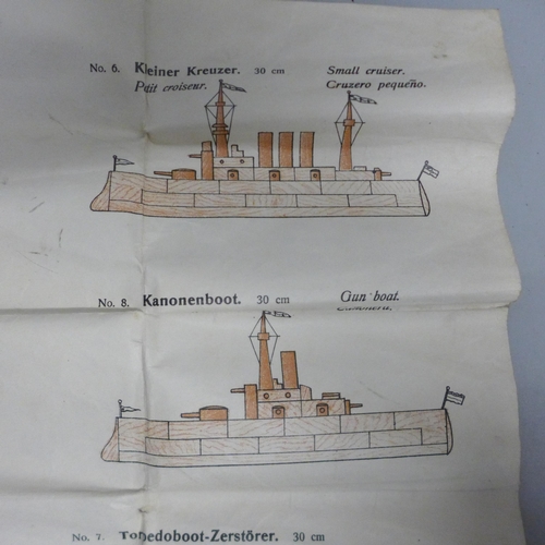 761 - An early 20th Century wooden shipbuilding game and instructions