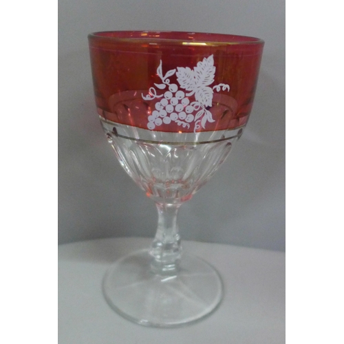 766 - A box of mixed drinking glasses, eight various etched champagne coups, two sets of six ruby flash gl... 