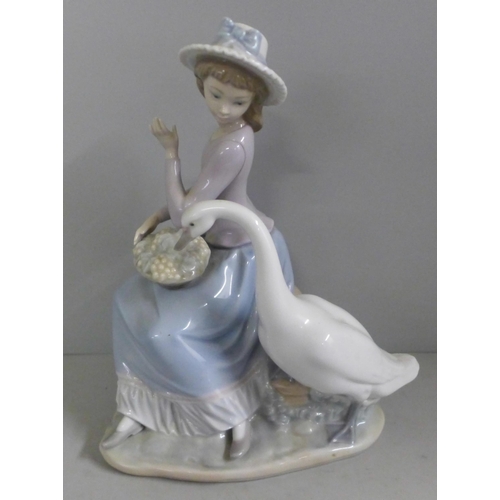 789 - A Hillstonia smooth stoneware vase, Lladro lady and geese figure and a large Victorian glazed jardin... 