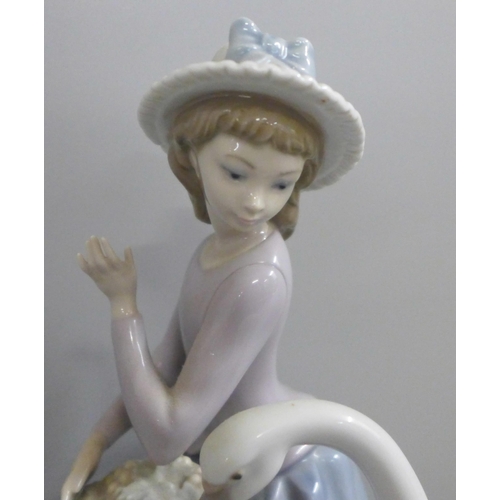 789 - A Hillstonia smooth stoneware vase, Lladro lady and geese figure and a large Victorian glazed jardin... 