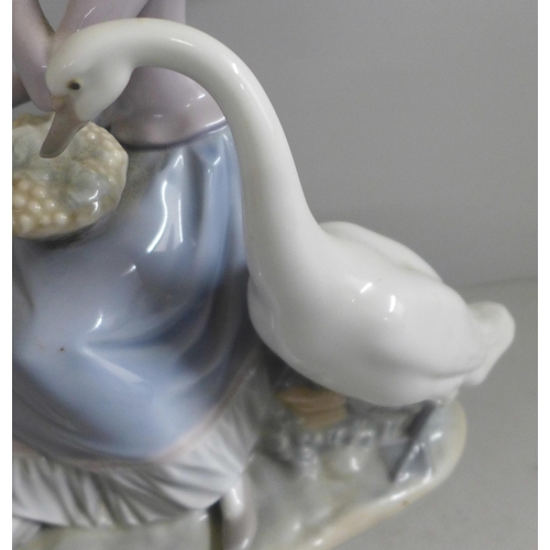 789 - A Hillstonia smooth stoneware vase, Lladro lady and geese figure and a large Victorian glazed jardin... 