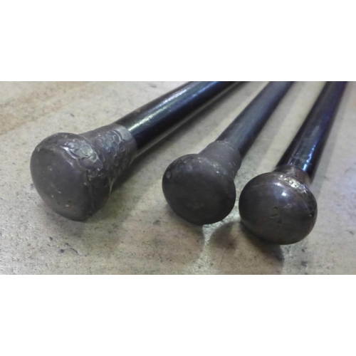 802 - Three silver topped walking canes