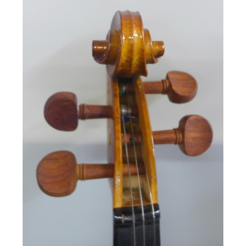 805 - Two cased violins and bows, both backs 33.5cm approximately excluding button