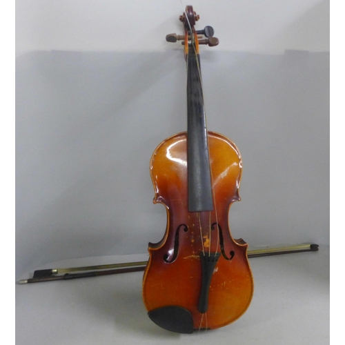 805 - Two cased violins and bows, both backs 33.5cm approximately excluding button