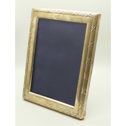 817 - A silver photograph frame, height 15.5cm