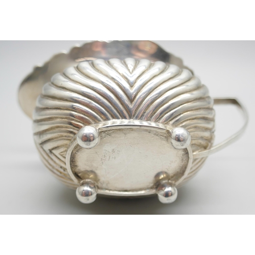 834 - A small Victorian silver jug, scroll mount and half fluted decoration, London 1894, 76g