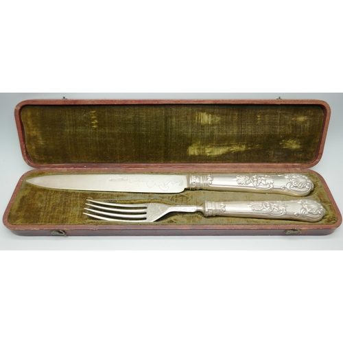 838 - A 19th Century silver knife and fork in a fitted case, Sheffield 1835