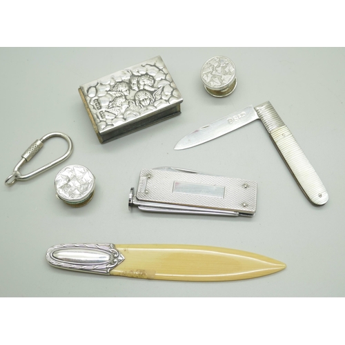 850 - A Georgian silver fruit knife, a small silver matchbox case, a silver pipe smokers knife, etc.