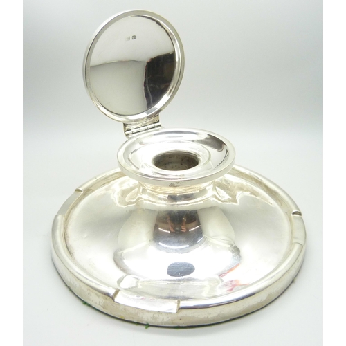 854 - A large silver Capstan inkwell, worn Birmingham hallmark, diameter of base 17.5cm