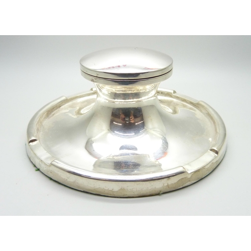 854 - A large silver Capstan inkwell, worn Birmingham hallmark, diameter of base 17.5cm