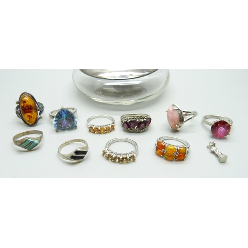 871 - Ten silver gem set and stone set rings, a silver topped jar and a silver charm