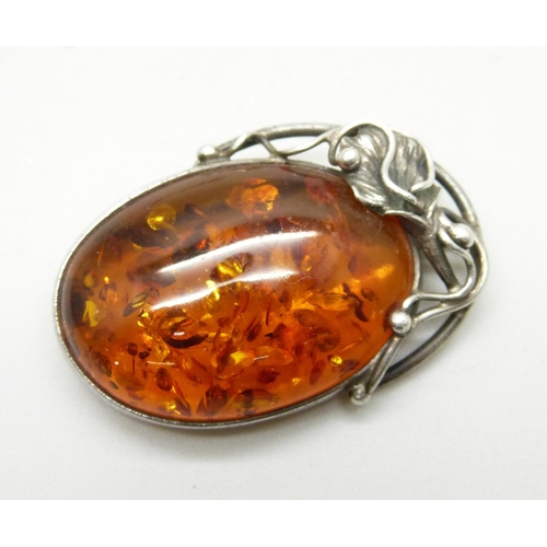 875 - A silver and amber brooch and bracelet