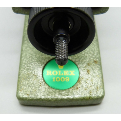 881 - A Rolex 1009 bezel removing tool