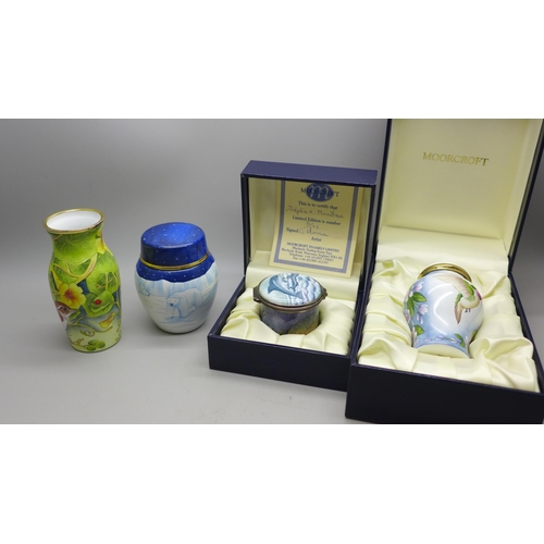 887 - Four Moorcroft enamels, Dolphin & Manatee pill box, 31/75, boxed, Hummingbird, boxed, vase decorated... 