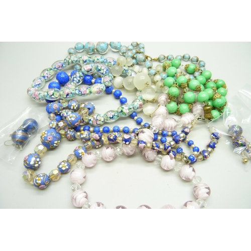 891 - A collection of vintage glass bead necklaces and two pairs of earrings