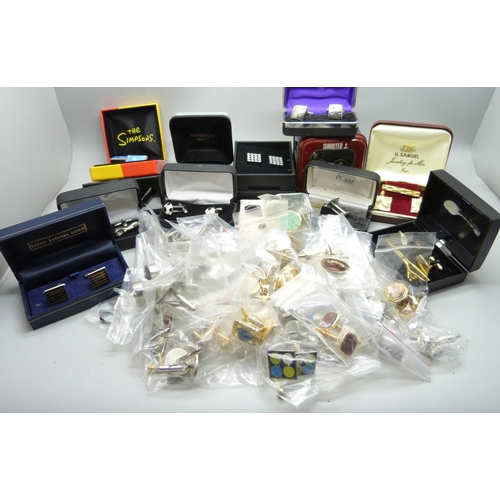 893 - A collection of of cufflinks and tie-pins, some boxed