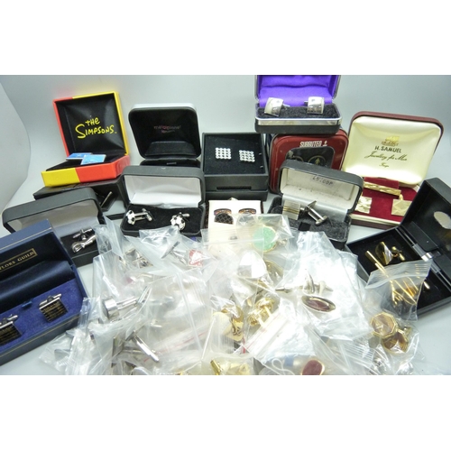 893 - A collection of of cufflinks and tie-pins, some boxed