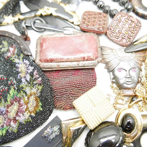 909 - A collection of vintage costume jewellery, etc., including a Georgian miser's purse