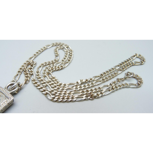 932 - A silver ingot pendant on a silver chain, 39g, chain 59cm