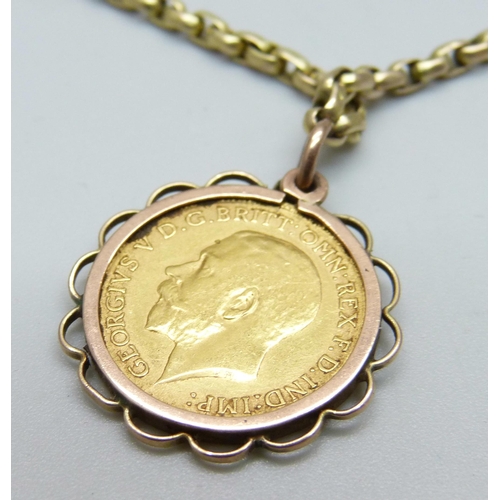 951 - A 1913 half sovereign in a 9ct gold pendant mount and a 9ct gold chain, total weight 14.5g, chain 50... 