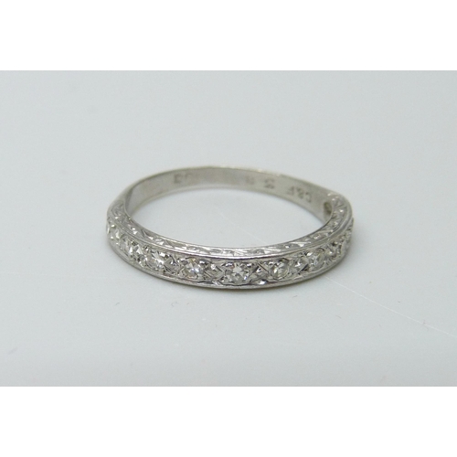 957 - An 18ct white gold and diamond half-eternity ring, 2.2g, K