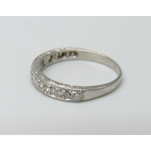 957 - An 18ct white gold and diamond half-eternity ring, 2.2g, K