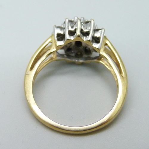 960 - An 18ct gold and diamond cluster ring, 1ct of diamonds marked on the shank, 4.8g, N