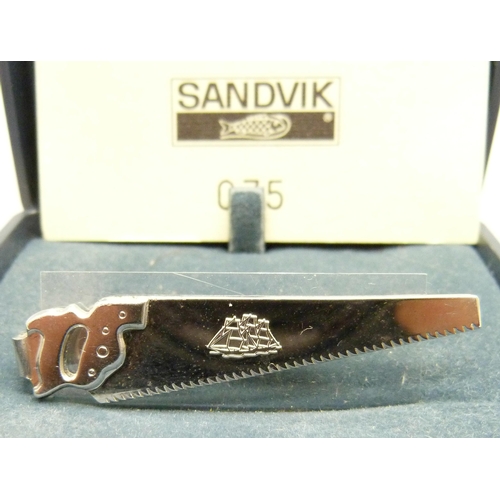 980 - A hallmarked Swedish silver tie-clip, limited edition solid silver 'Sandvik Handsaws', 075, boxed wi... 