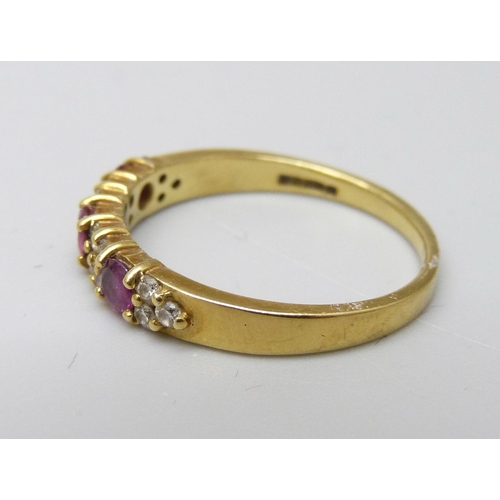 987 - An 18ct gold, ruby and diamond ring, 2.9g, N