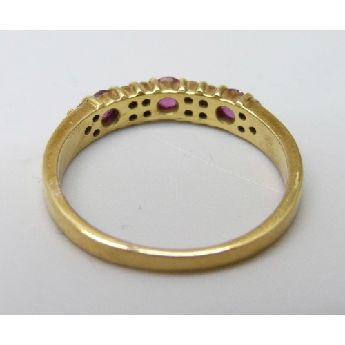 987 - An 18ct gold, ruby and diamond ring, 2.9g, N